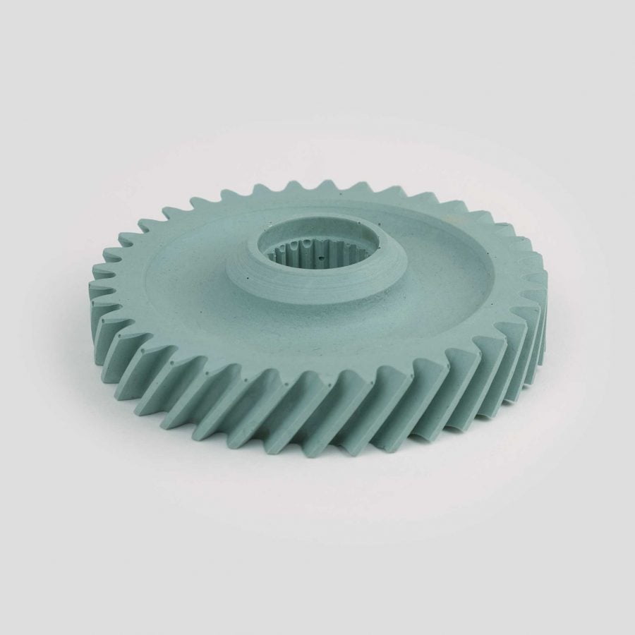 Helical gear candle holder cast in pigment dyed powdered slate